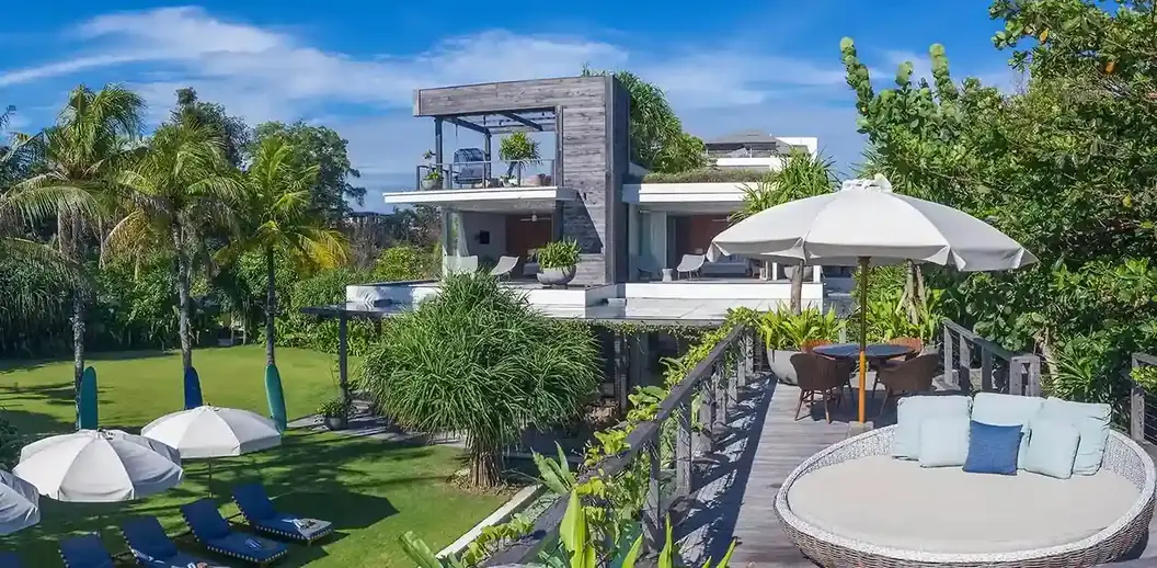 Villa garden with sun loungers in Bali