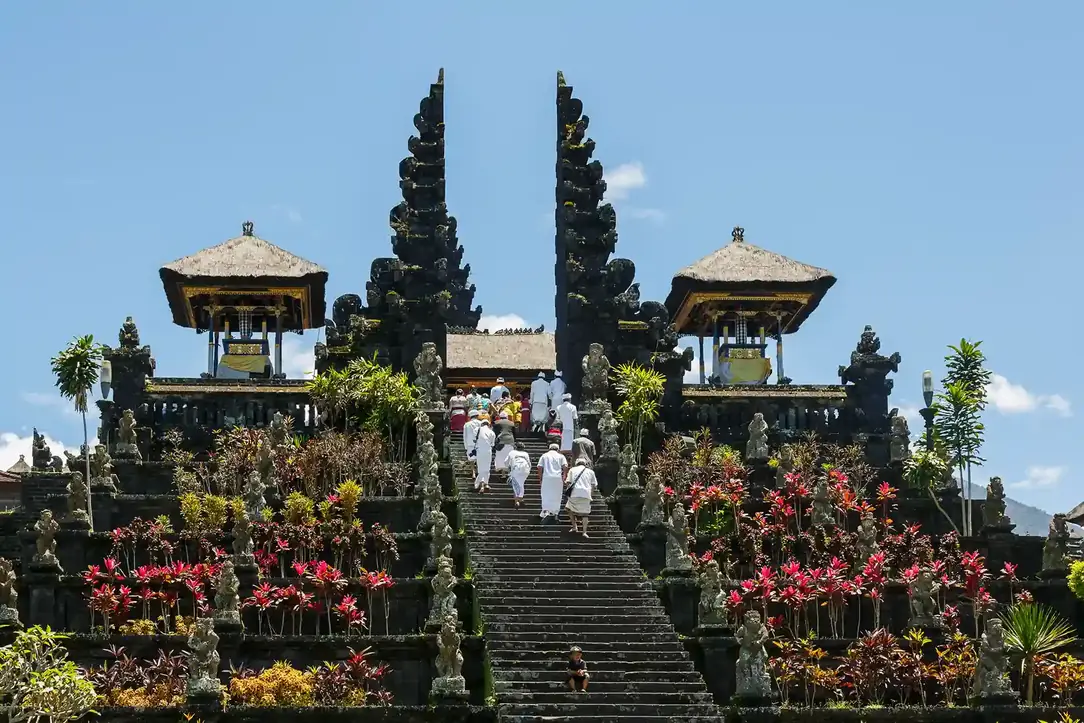 Worshippers climbing the steps of Pura Besakih, the mother temple of Bali